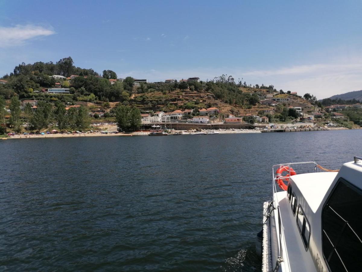 Douro Houseboats Hotel มาร์โก เดอ คานาเวเซส ภายนอก รูปภาพ