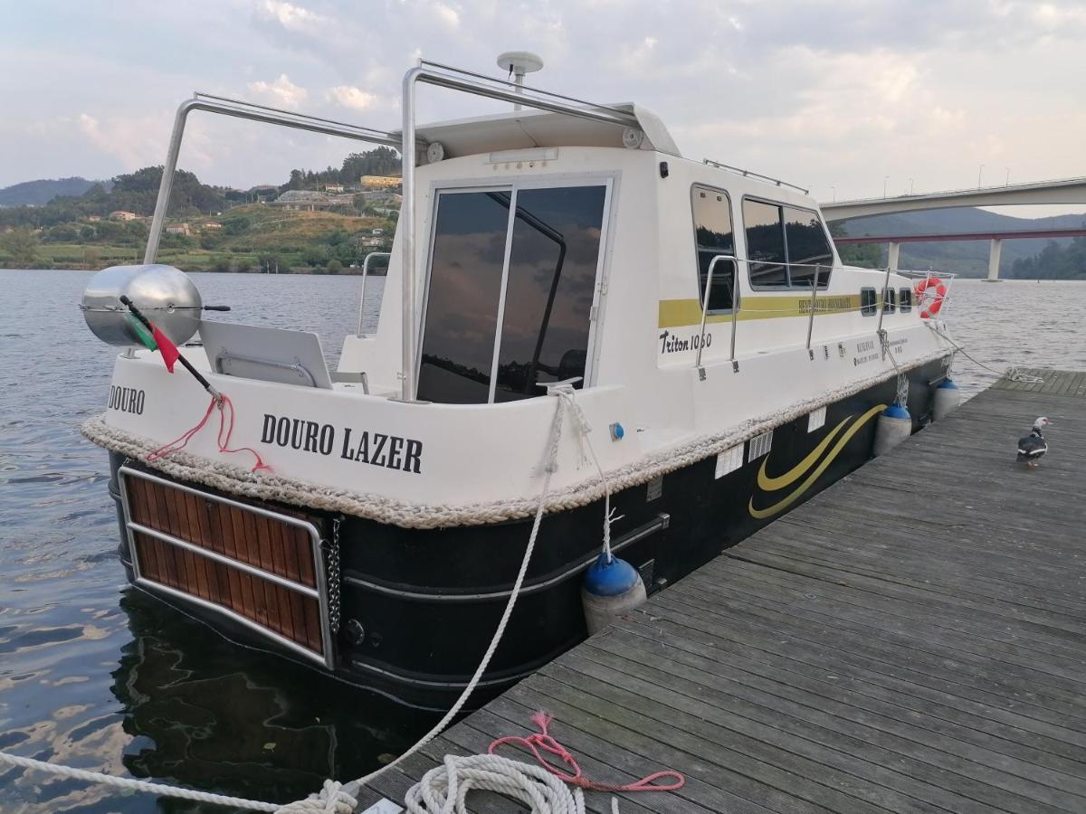 Douro Houseboats Hotel มาร์โก เดอ คานาเวเซส ภายนอก รูปภาพ