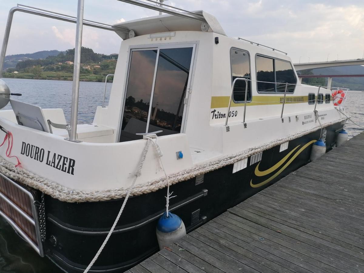 Douro Houseboats Hotel มาร์โก เดอ คานาเวเซส ภายนอก รูปภาพ